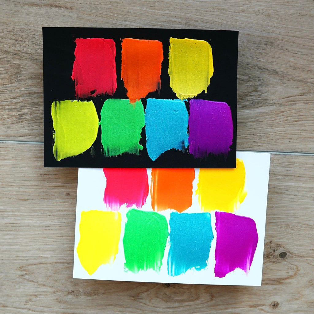 Ranger Simon Hurley Neon Lunar Paste Bundle Of 7 swatches on black and white cardstock